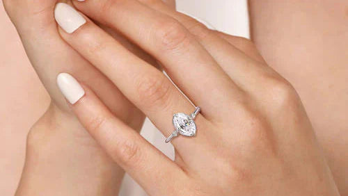 woman wearing an engagement ring