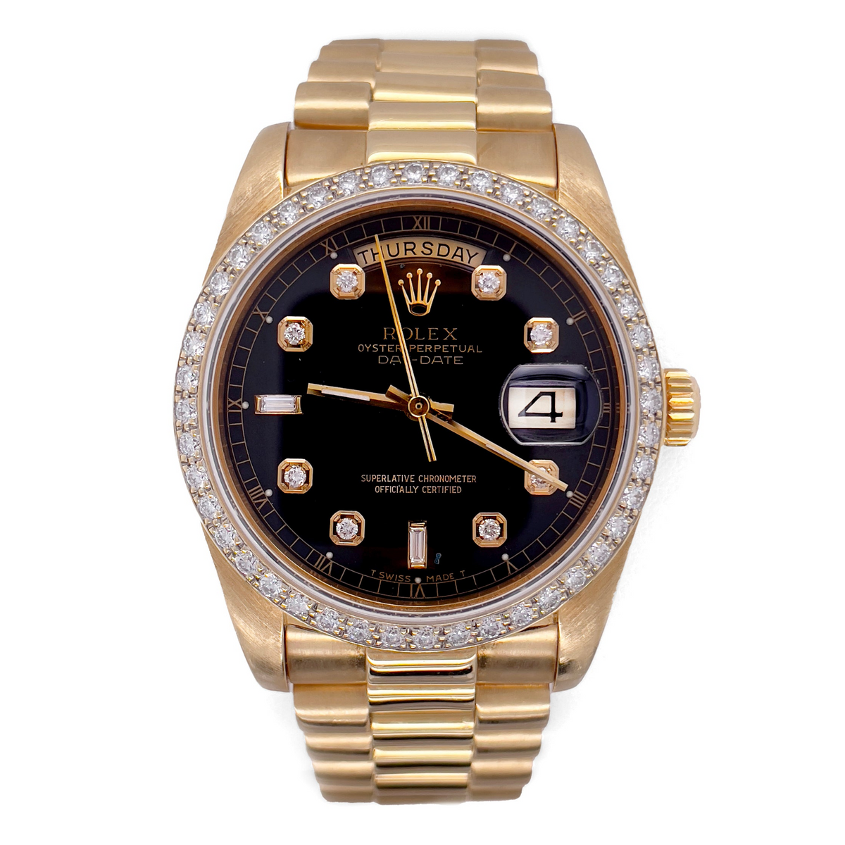 A Rolex President Date-Just in 18 karat yellow gold with a bead set diamond bezel.